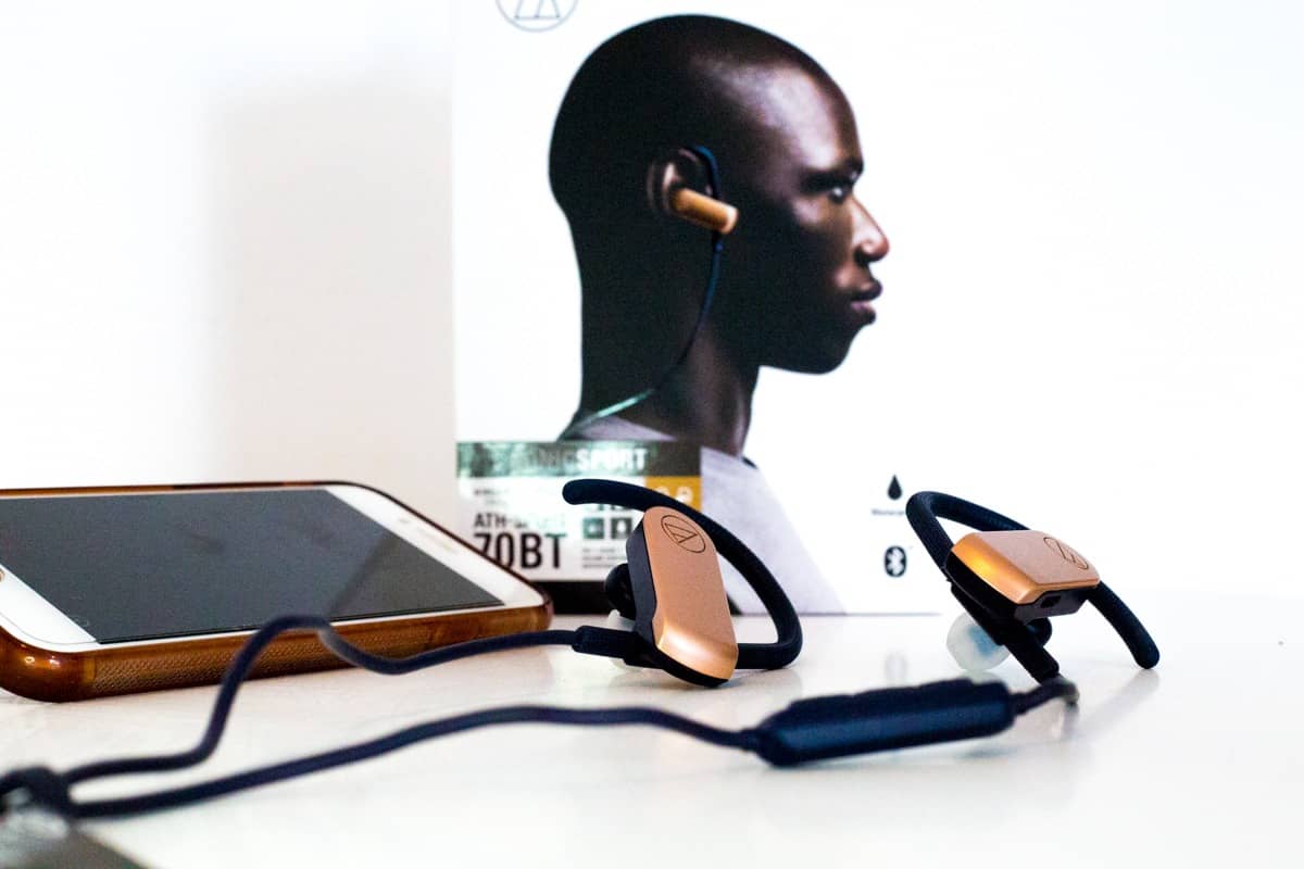 23 Unique Travel Gifts For Every Kind Of Traveller 1 audio-technica ATH-SPORT70BT headphones