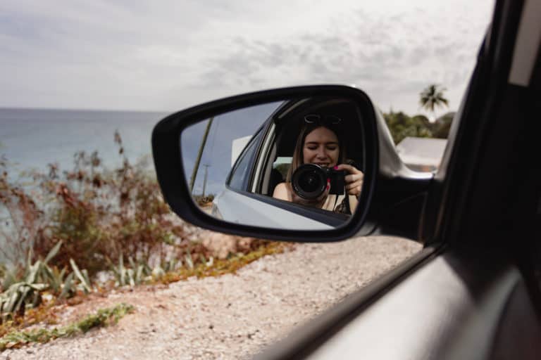 Taking photos in an Antigua rental car with my blogging camera
