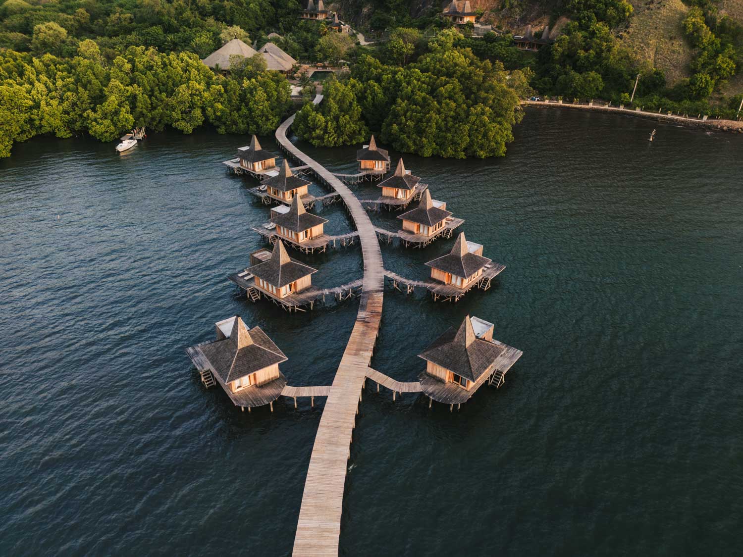 Aerial view of the sea suites at Menjaga Bay Resort Flores Island Indonesia