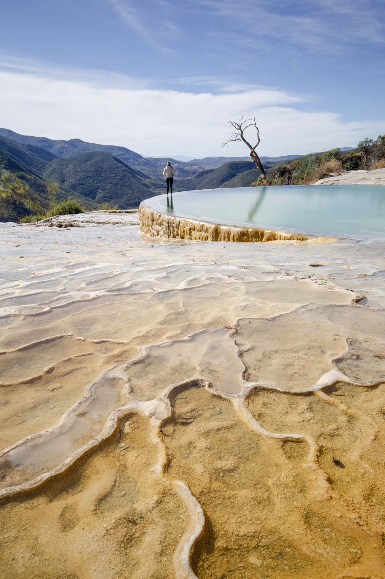 Mexico Blog Posts 1 Jodie standing on Hierve El Agua Mexico