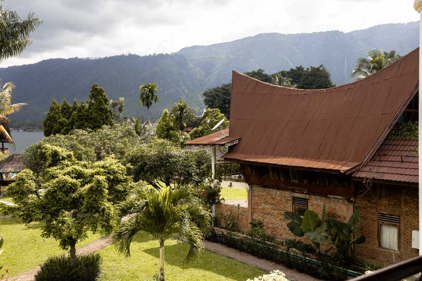 A Unique Stay At Tabo Cottages, Samosir Island: A Lake Toba hotel with a story 8 Outside of a Batak villa at Tabo Cottages hotel in Lake Toba