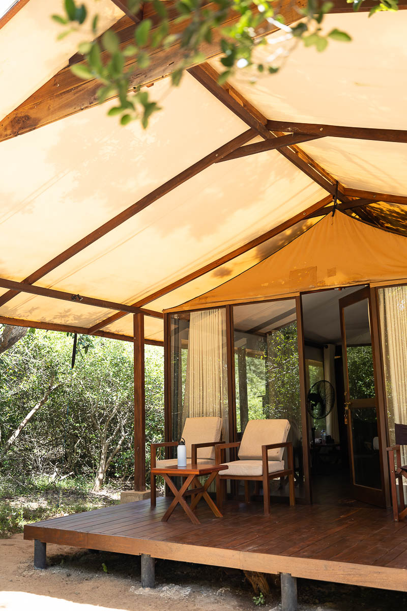 Wild Trails Yala by Suri: A Sustainable Tented Safari Camp Experience on the Edge of Yala National Park, Sri Lanka 10 Outside chairs on the deck of a tent at Wild Trails Yala by Suri