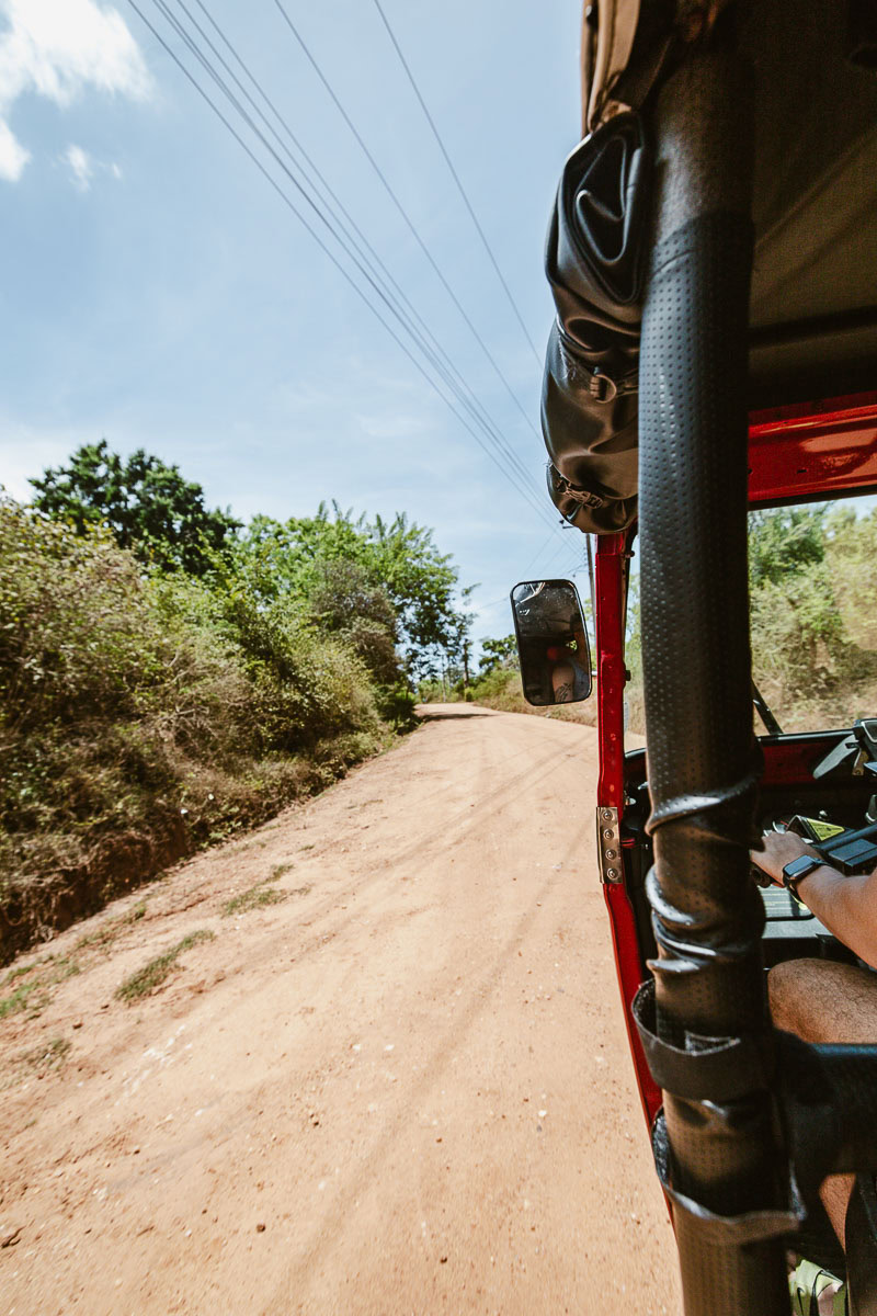 Wild Trails Yala by Suri: A Sustainable Tented Safari Camp Experience on the Edge of Yala National Park, Sri Lanka 1 The road to Wild Trails Yala by Suri, as seen from the back of a red tuktuk