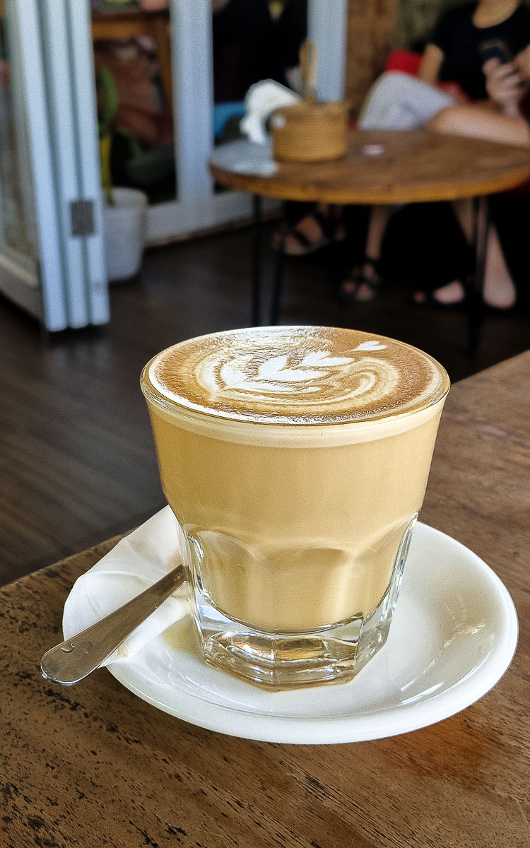 Vegan Canggu: A tried-and-tested guide to vegan cafes & restaurants in Bali's digital nomad hotspot 20 Coffee with latte art at Nyom Nyom restaurant in Canggu Bali