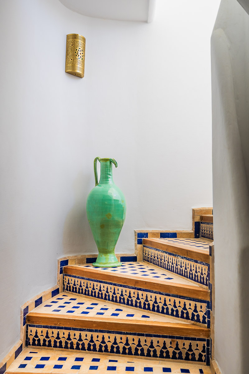 Kasbah House Tangier: Unassuming Luxury in the Heart of Tangier's Medina 1 Vase on tiled stairs at Kasbah House boutique hotel in Tangier Morocco