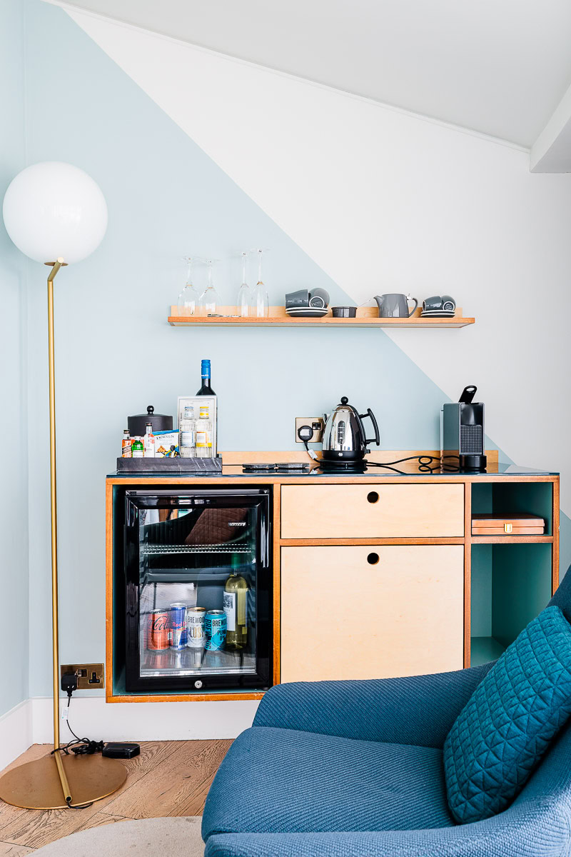 Marrable’s Farringdon Hotel: A Stylishly Understated Green Hotel in London's Clerkenwell 8 Mini bar and velvet chair in hotel room in London